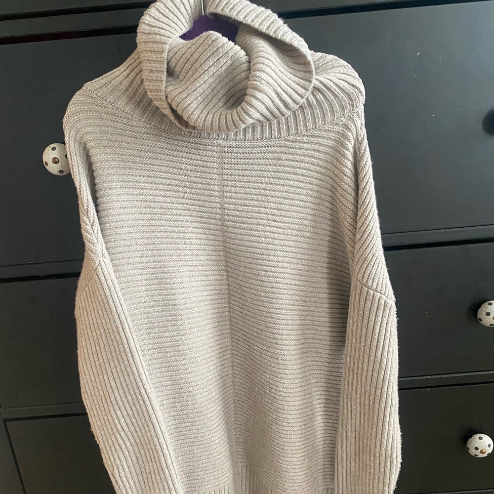 oversized beige turtleneck sweater